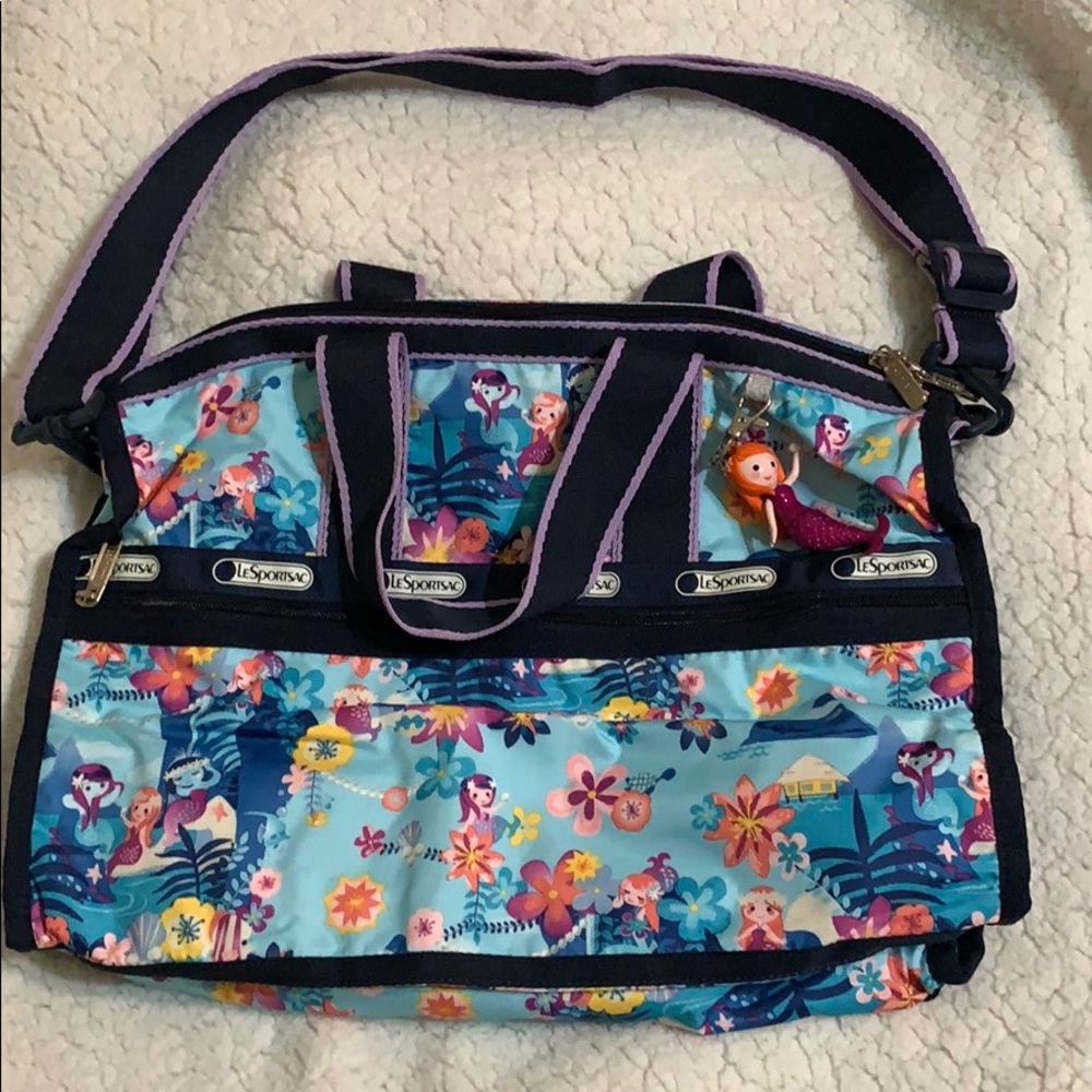 New LeSportsac Disney Small World Weekender Bag